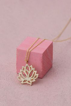 Gold Diamond Lotus Flower Bridal Pendant Necklace, Dainty Wedding Floral Charm Necklace, Lotus Flower Jewelry, 14k 18k 10k Gold Necklace FEATURES * Solid Gold (real gold, not gold plated or gold filled material) * Gold Karat: 10K (417) - 14K (585) - 18K (750) (optional) * Pendant Height: 0.61 Inches (1.55 cm) * Pendant Width: 0.59 Inches (1.50 cm) * Available Gold Color: Yellow gold, rose gold and white gold (optional) * Diamond weight: 0.29 ct * Diamond color: G-H Color * Diamond clarity: SI Wh Bridal Pendant Necklace, Lotus Flower Jewelry, Lotus Flower Necklace, Bridal Pendant, Dainty Wedding, Lotus Jewelry, Gold Lotus, Cz Necklace, Flower Jewelry