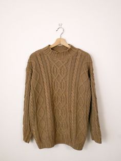 Vintage Tortilla Brown Cable knit Cotton Sweater. Measurements Length: 24" Armpit to armpit: 23" Armpit to end of sleeve: 19" Condition: Gently used. There's dark stains as shown in the last two pics. AS IS.  ※Please read the policy before you purchase※ Beige Stretch Cable Knit Sweater, Stretch Beige Cable Knit Sweater, Cozy Stretch Knit Sweater, Cozy Fit Brown Knitted Sweater, Brown Cable Knit Crew Neck Sweater, Brown Cable Knit Crew Neck Top, Stretch Brown Knitted Sweater, Vintage Long Sleeve Soft Knit Sweater, Brown Knit Stretch Sweater