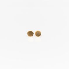 Small, simple, and beautiful, these stunning studs are sure to be a new favorite. Materials: 14k Gold Fill, Sterling Silver Measurements: .25" x .25" Classic Circle Earrings For Everyday, Classic Hammered Earrings For Everyday, Minimalist Round Earrings, Modern 14k Gold Circle Earrings, Minimalist Hammered Jewelry For Formal Occasions, Formal Minimalist Hammered Jewelry, Gold Minimalist Studs For Gift, Minimalist Round Earrings With Simple Design, 14k Gold Round Everyday Earrings