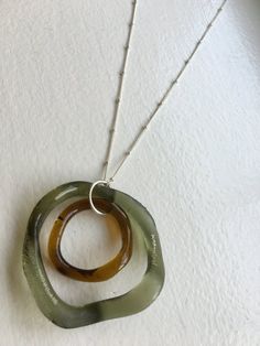 Aveda bottle glass pendant Circle Jewelry, Beachglass Jewelry, Bottle Jewelry, Glass Bottle Crafts, Fused Glass Jewelry, Glass Pendant Necklace, Sea Glass Necklace, Dope Jewelry, Creating Jewelry