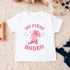 My First Rodeo Birthday Shirt, Rodeo Birthday, Birthday Girl Shirt, Cowgirl Birthday, First Birthday Shirt, Toddler Birthday Shirt - Etsy First Birthday Name Print Top, Pink Top With Funny Print For First Birthday, Pink T-shirt With Funny Print For First Birthday, Pink Crew Neck Shirt For First Birthday, Cute Shirt With Graphic Print For First Birthday, Cute Graphic Print Shirt For First Birthday, Cute Top With Name Print For First Birthday, Cute Tops With Name Print For First Birthday, Pink Shirt With Funny Print For Birthday