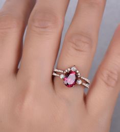 Ruby Ring, Rose Gold Ruby Opal Wedding Ring Set, July Birthstone Ring, Opal Stacking Band, Ruby Dainty Ring, Promise Ring, Anniversary Ring Unique wedding set,perfect as engagement/wedding ring, birthday or anniversary gift, etc. If you need one more wedding band, please see the below link: www.etsy.com/listing/851040980/opal-stacking-band-dainty-opal-ring-opal?ref=shop_home_active_1 Opal ring set: www.etsy.com/listing/685847028/opal-ringwhite-fire-opal-engagement-ring?ref=shop_home_feat_2&b Ruby Cluster Ring With Halo, Ruby Cluster Ring With Halo For Wedding, Ruby Halo Cluster Ring For Wedding, Ruby Halo Jewelry For Wedding, Rose Gold Rings With Accent Stones For Marriage, Pink Halo Ring For Wedding, Rose Gold Oval Ruby Ring For Wedding, Oval Rose Gold Ruby Ring For Wedding, Ruby Crystal Wedding Ring