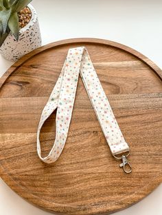 "This handmade lanyard is a stylish and functional accessory for holding keys, badges, or ID cards. Made with high-quality materials, it features a durable and comfortable strap that can be easily attached to any item. The unique design adds a personal touch to your everyday essentials. Perfect for students, teachers, or anyone who needs to keep their items easily accessible.   D I M E N S I O N S: 36\" circumference of opening 1\" wide Made with 100% cotton C A R E: - Machine wash cold or hand wash - Hang or lay flat to dry - Iron for the best result Design may slightly differ from the images due to the handmade nature." White Lanyard With Key Clip For Everyday Use, White Lanyards With Key Clip For Everyday Use, White Lanyards With Key Clip, Muted Rainbow, Rainbow Stars, Badge Lanyard, Key Lanyard, Rainbow Star, Functional Accessories