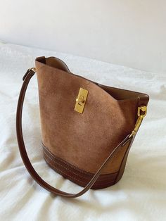 2023 New style. Simple leather bucket bag. Material: PU Leather Size: 8.2"H x 7.8"W x 5.1"D Designer Style ID: 8565 Chic Bucket Leather Bag with Shoulder Strap and Inner Pouch, Women's Everyday Handbag Everyday Bucket Shoulder Bag With Gold-tone Hardware, Gold-tone Hardware Bucket Shoulder Bag, Daily Use Bucket Shoulder Bag With Gold-tone Hardware, Gold-tone Hardware Bucket Shoulder Bag For Daily Use, Gold-tone Hardware Bucket Shoulder Bag For Shopping, Trendy Bucket Bag With Gold-tone Hardware, Daily Use Bucket Bag With Snap Closure, Chic Shoulder Bucket Bag With Snap Closure, Office Bag With Gold-tone Hardware In Bucket Shape