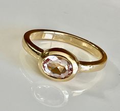 Morganite Ring in 14K Solid Gold. Natural Morganite Ring 14K Solid Gold Natural and Beautiful Stone Size Approximately 5X7 to 6X8 Shank Thickness Aprxly. 2.3 mm Oval Shape Avarage Ring Weighs about 4.5 Grams (May Vary Based on Ring Size) Made in USA FREE Shipping in USA Heirloom Morganite Rings, Heirloom Jewelry With Round Cut Morganite, Gold Morganite Round Ring, Heirloom Morganite Jewelry In Yellow Gold, Yellow Gold Oval Morganite Sapphire Ring, Gold Morganite Solitaire Ring, Oval Morganite Ring In Yellow Gold, Heirloom Morganite Round Cut Rings, Gift Morganite Crystal Ring, Round Shape