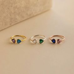 Introducing our Duo Heart Birthstone Ring, featuring two delicately crafted heart-shaped gemstones of your choice. Symbolizing love and connection, this elegant ring is perfect for celebrating special relationships, cherishing meaningful moments and adding a touch of personalized charm to your jewelry collection ♡ SKU: MM-RM126 Product Details Material: High Quality Solid 925 Sterling Silver Finish: 18K Gold ∙ Sterling Silver ∙ Rose Gold Featuring two ~6mm Heart-Shaped CZ Gemstones on a dainty ~ Domed Ring, Elegant Ring, Birthstone Necklace, Birthstone Ring, Silver Rose Gold, Silver Roses, Solid 925 Sterling Silver, Rose Gold Ring, Or Rose