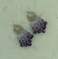 CHANDELIER EARRINGS: 3 Shades of Purples by JaspersJewels on Etsy Nickel-free Spiritual Earrings For Wedding, Silver Round Bead Costume Earrings, Silver Crystal Earrings With Dangling Beads, Ornate Purple Dangle Earrings, Ornate Purple Drop Earrings, Silver Round Crystal Earrings With Dangling Beads, Ornate Purple Dangle Jewelry, Silver Costume Jewelry Earrings For Celebration, Ornate Purple Jewelry With Matching Earrings