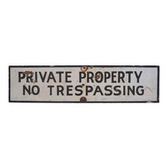 a private property no trespassing sign is displayed on a white background with the words private property no trespassing