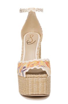 A raffia-wrapped platform and sky-high block heel lift a beachy ankle-strap sandal framed by dainty rickrack trim. 5 1/2" heel; 1 3/4" platform Adjustable ankle strap with buckle closure Textile upper/synthetic lining/rubber sole Imported Summer Beach Wedge Sandals With 4-inch Heel, Straw Ankle Strap Heels For Spring, Beige Sandals With 4-inch Heel For Summer, Summer Vacation Sandals With 4-inch Heel, Summer Vacation Heels With 4-inch Heel, Cream Platform Heels For Summer, Vacation Sandals With 4-inch Heel For Spring, 4-inch Heel Sandals For Vacation In Spring, Spring Vacation Sandals With 4-inch Heel