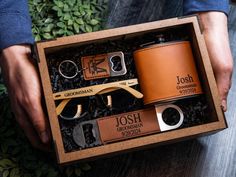 the groomsmen gift set includes two personalized flasks, a leather wrapped flask case, and three pairs of scissors