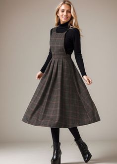 Keep your fashion game strong in our Plaid Wool Midi Dress or the equally stunning Wool Pinafore Dress. Level up your fashion quotient with our Pleated Dress or express your individuality through our Fit and Flare Wool dress. ★★FEATURES * 25% wool, other fiber,nylon * Polyester lining * Two side seam pockets * Right hidden zipper closure * Adjustable strap * Plaid Wool Dress * Wool Pinafore Dress * Fit and flare dress * Perfect for winter, autumn, spring * Dry clean ★★ Bespoke Order Service If you Request other color Request the length Your height is not between 155 cm- 172 cm Your weight is over 75 kg I can do it for you, It will need some extra fee depending on on your need. Contact with me for more detail. ★★ Get your size in Size Chart with your body measurement https://www.etsy.com/li Wool Jumper Dress, Vintage Plaid Dress For Winter, Vintage Plaid Winter Dress, Knee-length Fitted Pinafore Dress For Fall, Fitted Knee-length Pinafore Dress For Fall, Vintage Sleeveless Pinafore Dress For Fall, Plaid Pinafore Dress, Dark Academia Pinafore, Wool Pinafore