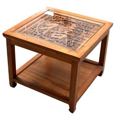 a wooden table with a glass top on it