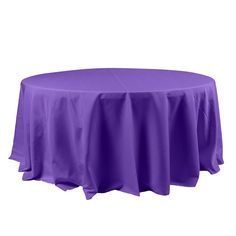 a round table with purple cloth on it