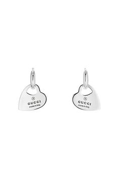 Gucci Trademark Stud Sterling Silver Earrings YBD79630200100U.The Gucci Trademark line combines motifs and hexagonal charms with the name of the House. From the cut-out heart to the padlock charm, playful symbols continue to distinguish a selection of rings, necklaces, bracelets and earrings for ... Diamond Accessories, Gucci Store, Golden Tree, Classic Aesthetic, Gucci Jewelry, Gucci Logo, Silver Heart Necklace, Square Diamond, Iconic Design