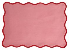 pink placemat with red scalloped edges