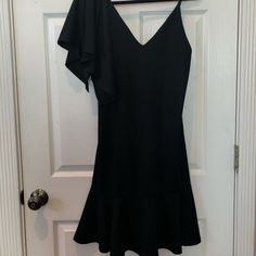 Nwt Zara Black Dress With Single Ruffle Sleeve And Spaghetti Strap. Super Cute And Great Fit, Serves A Fun Flattering Look. Size S Valentine’s Day Zara Black Dress, Ruffle Sleeve Dress, Zara Black, Zara Dresses, Sleeve Dress, Spaghetti Strap, Colorful Dresses, Spaghetti, Dresses With Sleeves