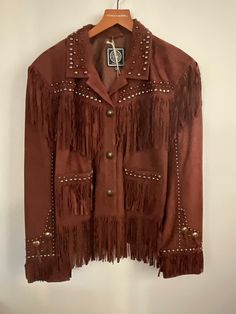 Doublr d ranch    cody  fall collection 2020         watanya cicilla      brown goats 100 %  suede               size  wx  , unisex  ,    retired  jacket , fully lined .     coming from one of the ddr  fall 2020 collections         this amazing fringed all over   jacket .. on pockets        and everywhere  is a gorgeous  work of            western art to wear ...       buy yours   before its gone  ..     no returns , no exchanges , no refunds   final sale Western Leather Outerwear For Rodeo, Western Style Leather Outerwear For Rodeo, Western Style Brown Leather Jacket For Winter, Brown Western Leather Jacket For Winter, Fall Leather Jacket For Rodeo, Western Brown Rodeo Outerwear, Brown Western Outerwear For Rodeo, Western Style Brown Outerwear For Rodeo, Western Brown Outerwear For Rodeo