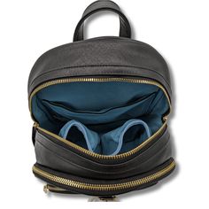 a black backpack with two pairs of shoes inside