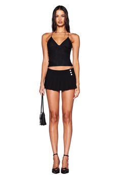 Details Best-selling Ellery style in an all new top style Black mesh top that skims the body and finishes in a straight hem Halter neck style with an adjustable silver bead detail at back neck to tighten or loosen as needed V-neckline with triangle bust cups Gathered detail along the bottom of the bust cups Exposed open back with multiple strapping detail Featuring two custom black butterfly details at back that connect with waist and back ties Partially lined. This style is slightly sheer We re I Am Gia Corset, Iamgia Yvette Top, Iamgia Top, Iamgia Ellery Dress, I Am Gia Black Set, Butterfly Details, Black Mesh Top, I Am Gia, Shop Tops