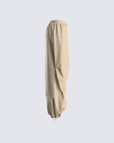 Parachute pants are a baddie essential, we don't make the rules 😜 Made with cargo pockets, an elastic waistband, and a functional drawcord for an adjustable look that is comfy, yet stylish 🖤 Baggy Utility Cargo Pants With Elastic Waistband, Baggy Straight Leg Cargo Pants With Elastic Waistband, Beige Full-length Parachute Pants For Streetwear, Solid Color Baggy Utility Parachute Pants, Baggy Solid Color Utility Parachute Pants, Baggy Solid Utility Parachute Pants, Stretch Ankle-length Cargo Pants For Streetwear, Baggy Cargo Trousers With Elastic Waistband, Baggy Cargo Pants With Elastic Waistband