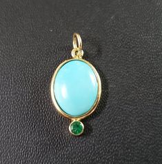 1. Turquoise 14k Gold Pendant 2. Natural Arizona 3. Gemstone - Turquoise 4. Jewelry Type - Pendant 5. Total weight - 1.550 Grams Approx 6. Turquoise Weight - 4.50 Carats Approx 7. Gold Weight - 0.634 Grams Approx. 8. Turquoise Size - 10x12 MM Approx 9. Emerald Weight - 0.07 Carat 10. Gold Purity - 14k 11. Pendant Bails Inner Size - 5.30 mm 12. Sleeping Beauty 13. Ready to dispatch in 1 - 2 days. 14. Handmade Items 15. AAA Quality Pendant 16. Bezel Setting 17. Price per piece Pictures are taken u Oval Emerald Gemstones With Accents, Oval Turquoise Multi-stone Jewelry, Oval Multi-stone Turquoise Jewelry, Elegant Turquoise Cabochon Gemstones, Round Turquoise Cabochon Gemstones, Oval Turquoise Stone Jewelry, Fine Jewelry Turquoise Oval Cabochon, Oval Turquoise Gemstones With Accents, Fine Jewelry With Oval Turquoise