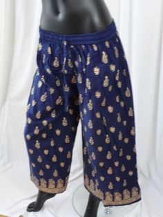 Indian, ethnic palazzo yoga pants-blue and gold: Artikrti believes that yoga wear ought to be colourful and full of cheer. Yoga pants ought to also be free flowing, light , airy, easy to wear and provide for ease in movement. And inspired by the palazzos, here we have Artikrti's yoga palazzos- bold striking colours, hand printed with interesting graphics in gold. This is part of Artikrti's ComfyCottons range of women's wear. The waist is elastic and the garment is practically free-size or fits m Blue Harem Yoga Pants, Hippie Blue Harem Pants, Blue Bohemian Wide-leg Harem Pants, Blue Full-length Cotton Harem Pants, Loose-fit Cotton Harem Yoga Pants, Blue Yoga Pants, Yoga Harem Pants, Yoga Legging, Pants Blue