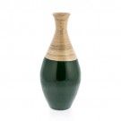 a green and gold vase on a white background