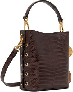 Croc-embossed UPPEAL™️ faux-leather shoulder bag in brown. · Detachable carry handle · Adjustable and detachable shoulder strap · Lace-up detailing at sides · Logo tag and disc at side · Magnetic closure · Patch pocket at interior · Faux-suede recycled nylon lining · Gold-tone hardware · H6.75 x W5.75 x D3 Made from cruelty-free, non-animal materials. Supplier color: Chocolate brown Stella Mccartney Frayme, Embossed Bag, Color Chocolate, Logo Tag, Magnetic Closure, Chocolate Brown, Stella Mccartney, Faux Suede, Patch Pocket