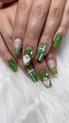 Bring the magic of a winter forest to your fingertips! These nails feature a deep green background with white and silver snowflakes, resembling a snow-covered forest floor. Knomes Nails, Christmas Gnome Nails Art, Gnome Nails Art, Gnome Christmas Nails, Christmas Character Nails, Gnome Nail Designs, Christmas Gnome Nails, St Patrick's Nails, St Patricks Day Nails Design