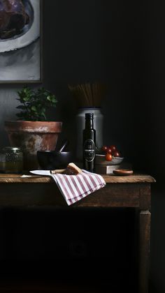 a wooden table topped with lots of food