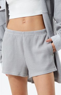 PacSun's Easy Mini Waffle Lounge Shorts are so comfortable that you won't want to take them off! These shorts feature a waffle-knit texture, side pockets, an elastic waistband, and a relaxed fit. 


	11.5" rise
	2.75" inseam
	Waffle-knit texture
	Elastic waistband 
	Relaxed fit
	Side pockets
	PacSun branding
	65% polyester, 35% cotton
	Model is wearing a small Comfy Shorts With Ribbed Waistband For Loungewear, Casual Cotton Pajama Shorts With Ribbed Waistband, Summer Pajama Shorts With Ribbed Waistband, Waffle Knit Short Set, Pacsun Outfits, Waffle Knit Shorts, My Mobile Number, Lounge Shorts, Print Pajamas