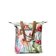 This carry-all tote features a fun cactus floral print and is just the right size to transport a few daily essentials. Simple zippered top keeps them all enclosed. \r\n\r\nZippered top\r\nCotton\r\nMeasures: 15 1/2 x 6 x 16 1/2\r\nTall Tote Cactus Floral | Women's Tall Tote Cactus Floral in Multi Cotton, Size: OS by Ariat Casual Reversible Bags For Spring, Casual Floral Print Bags For Vacation, Casual Reversible Spring Bags, Casual Canvas Bag With Floral Print, Casual Travel Bag With Floral Print, Casual Multicolor Floral Print Bag, Casual Floral Print Travel Bag, English Riding Boots, Bohemian Multicolor Floral Print Bag