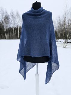 READY TO SHIP Wool Poncho Mohair Silk Wrap Evening Shawls Wraps Spring Poncho Warm Cape Knitted Navy Blue Poncho Oversized Sweater Plus Size Beach Poncho Gift for her Gift for Mom Soft and elegant womens versatile poncho- shawl, oversized sweater, perfect lightweight cover up for any kinds of seasons or occasions. Because of natural kid mohair wool and silk, this ladies poncho is warm and breathable.  Material : 75 % kid mohair                   25 % silk Colour: Navy Blue Size: One size for S,M Blue One Size Shawl For Winter, Blue One-size Winter Shawl, Blue Shawl Poncho For The Beach, Blue Shawl Poncho For Beach, Blue Cozy Poncho One Size, Oversized Sweater Plus Size, Evening Shawls And Wraps, Boho Wear, Alpaca Poncho