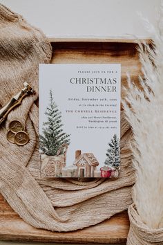 a christmas dinner menu on a wooden tray