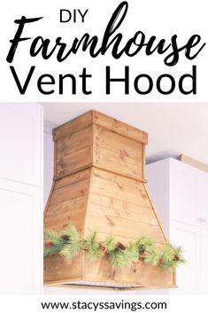 a diy farmhouse vent hood with pine cones and evergreens on it in the kitchen