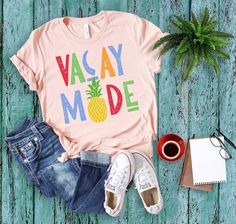 "Vacation Shirt, Vacay Mode Shirt, Vacation Shirts for Women, Funny Travel Shirt, Vacay Mode, Vacation Tees,Traveler Gift,Womens Travel Shirt BLACK TEXT is used by for Yellow, Heather Peach, White, Light Gray Heather Shirts. WHITE TEXT is used by Other Colored Shirts. * Please make sure you check our size cards before you place your order. ---How To Order --- 1-) Please check and review all photos 2-) Select your T-Shirt size and color from drop-down menus 3-) Choose the quantity 4-) Click ADD T Funny Travel, Vacay Mode, Travel Shirt, Travel Humor, Travel Shirts, Vacation Shirts, Shirts For Women, Product Pictures, Female Travel