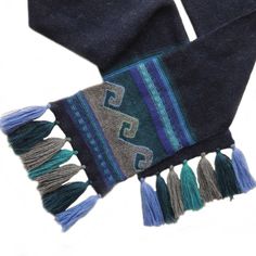 "Double knitted scarf with ethnic pattern, in super soft 100% alpaca, dark blue. Fringes in 3 colors Productcode: 001-11-2075-01 Material: 100% baby alpaca Size: L 71\" / 180 cm W 8\" / 17 cm Color: dark blue, multi Weight: 244 gram / 0.538lbs Price including shipping by Serpost del Peru, delivery by the local post in your country. World wide delivery Alpaca (Baby Alpaca) is one of the finest fibres in the World, Luxuriously soft, lightweight and warm, four times warmer than sheep wool. For peop Bohemian Handwoven Alpaca Scarves, Handwoven Alpaca Winter Scarf, Bohemian Alpaca Scarves For Winter, Handwoven Alpaca Scarves For Winter, Ethnic Patterns, Baby Alpaca, Double Knitting, Sheep Wool, Winter Glove