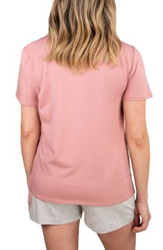 Made with a tulip-hem overlay for quick nursing access, this relaxed T-shirt is sure to be a mainstay for on-the-go parents. Surplice crewneck   Short sleeves   47% Tencel® modal, 47% cotton, 6% elastane   Tencel modal is a sustainably produced fiber made with closed-loop processing and is certified with the EU Ecolabel as having a low environmental impact throughout the entire lifecycle   Machine wash, tumble dry   Made in Turkey   OEKO-TEX®–certified materials free of harmful substances Spring Solid Color Nursing Tops, Comfortable Pink Crew Neck Top, Cotton Nursing Friendly Tops, Cotton Nursing-friendly Tops, Casual Pink Nursing Tops, Casual Pink Tops With Shirttail Hem, Comfortable Pink Tops For Spring, Pink Cotton Top With Shirttail Hem, Comfortable Pink Crew Neck T-shirt