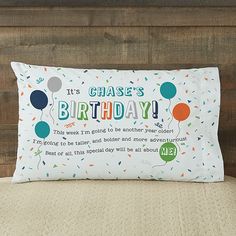 a pillow that says it's chase's birthday with balloons and confetti