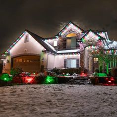 a house with christmas lights on the roof