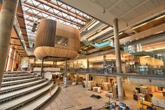 the inside of a large building with lots of stairs