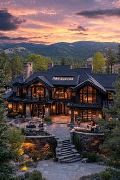 this is an image of a beautiful house in the mountains at sunset or sunrise time