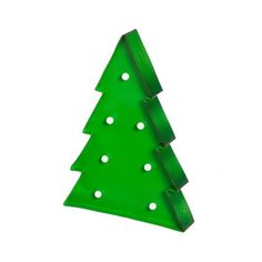 a green plastic christmas tree with holes in the bottom, on a white background photo