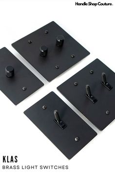 three pieces of black metal with screws and knobs on each side are shown