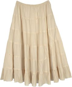 An elegant beige colored tiered midi skirt in cotton that keeps you comfy and cool this season.  This skirt comes with an elastic waist and pockets on the sides for convenience. #tlb #TieredSkirt #Peasant #Pocket #Fall #Solid #FairycoreSkirt #TieredSkirt #PixieSkirt Beige Tiered Lined Maxi Skirt, Cream Cotton Ruffled Skirt, Beige Relaxed Tiered Maxi Skirt, Relaxed Beige Tiered Maxi Skirt, Beige Cotton Skirt With Ruffles, Casual Beige Tiered Skirt, Beige Flowy Tiered Skirt, Flowy Cream Cotton Maxi Skirt, Spring Cream Cotton Maxi Skirt