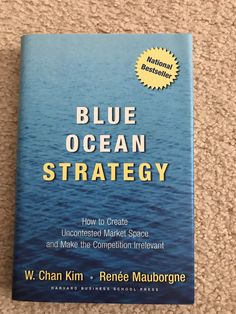 blue ocean strategy book sitting on the floor