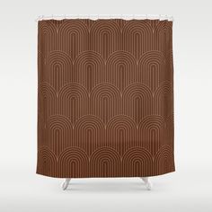 a brown shower curtain with an art deco design