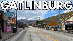 the words gatlinburg are in front of an empty street