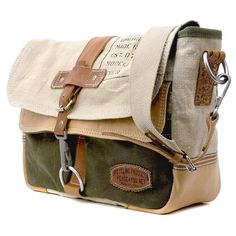 Military Style Khaki Bag For Adventure, Khaki Military Style Bag For Adventure, Vintage Khaki Shoulder Bag For Everyday, Vintage Cotton Shoulder Bag With Leather Handles, Everyday Vintage Khaki Shoulder Bag, Vintage Outdoor Satchel With Pockets, Vintage Outdoor Shoulder Bag With Pockets, Vintage Waxed Canvas Satchel For Outdoor, Vintage Shoulder Bag With Pockets For Outdoor