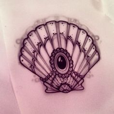 a drawing of a shell with an eye on it